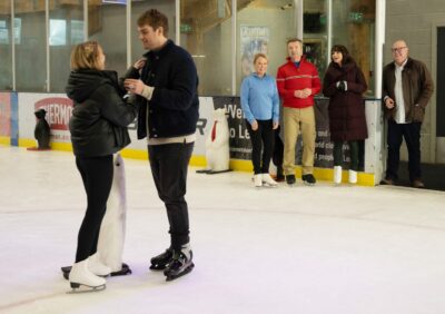 Torvill, Dean and Leyla look on as Belle proposes to Tom