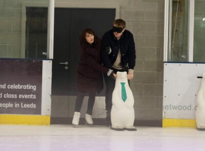 Belle takes Tom onto an ice rink on Emmerdale